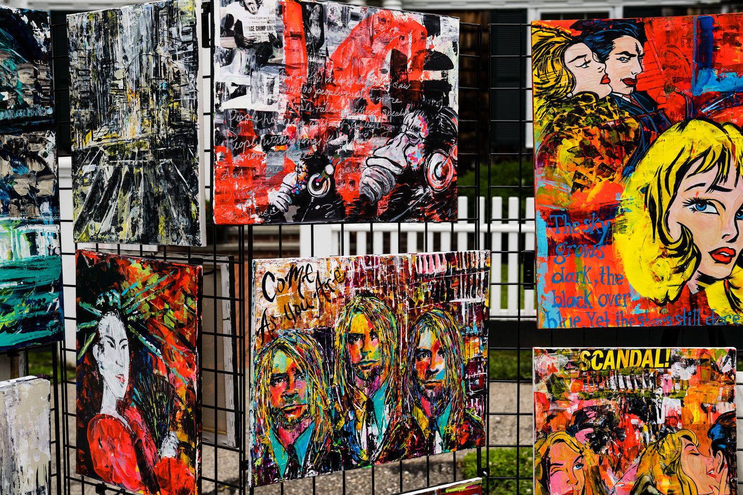 Jen Gilroy’s graphic and pop influence stood out, with bold color schemes and ravaged landscapes setting the scene for larger-than-life characters. In her faux triptych of Kurt Cobain, the voice of a generation’s expressions is slightly mottled in each rendition, capturing a turbulent frontman.